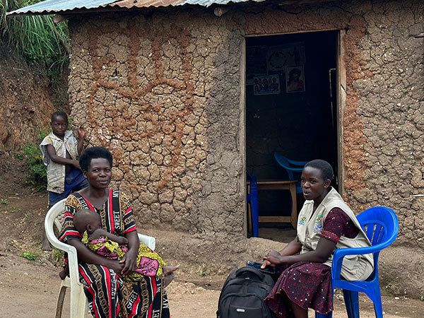 Ithugu Grace Backpack Nurse vists Jovia at her home
