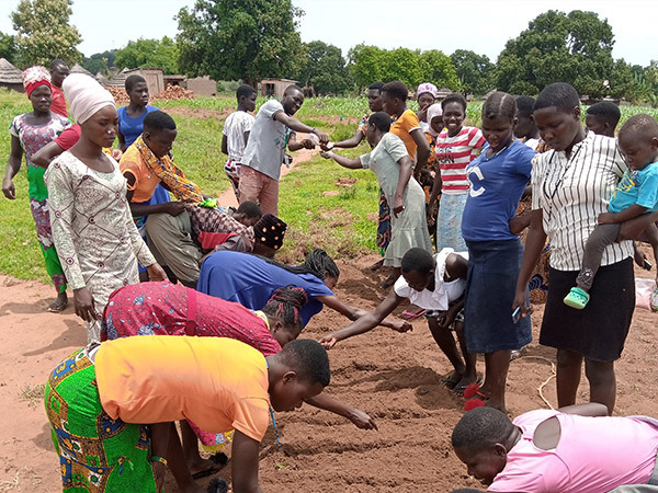 Members of a Womens Group establish their kitchen garden with support from RICE West Nile