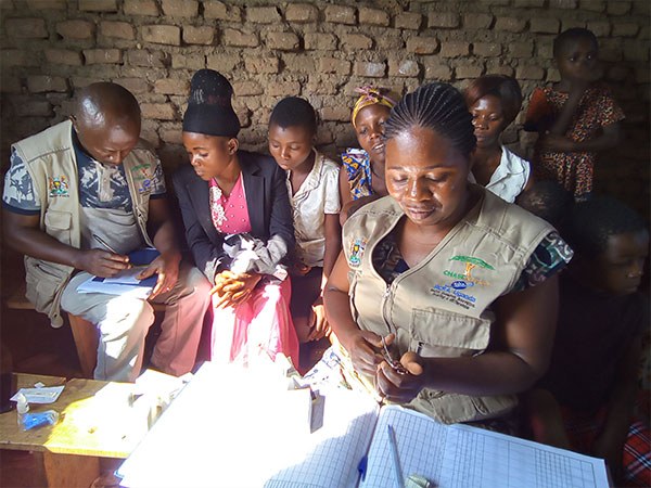RCRA Uganda CH Ws with clients mid image